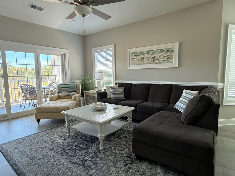 Spacious Living Room with Access to Balcony