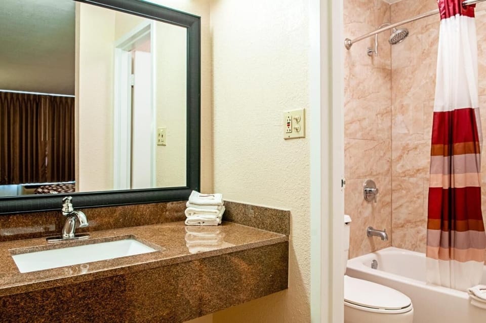Refresh in a bright bath with roomy vanity space.