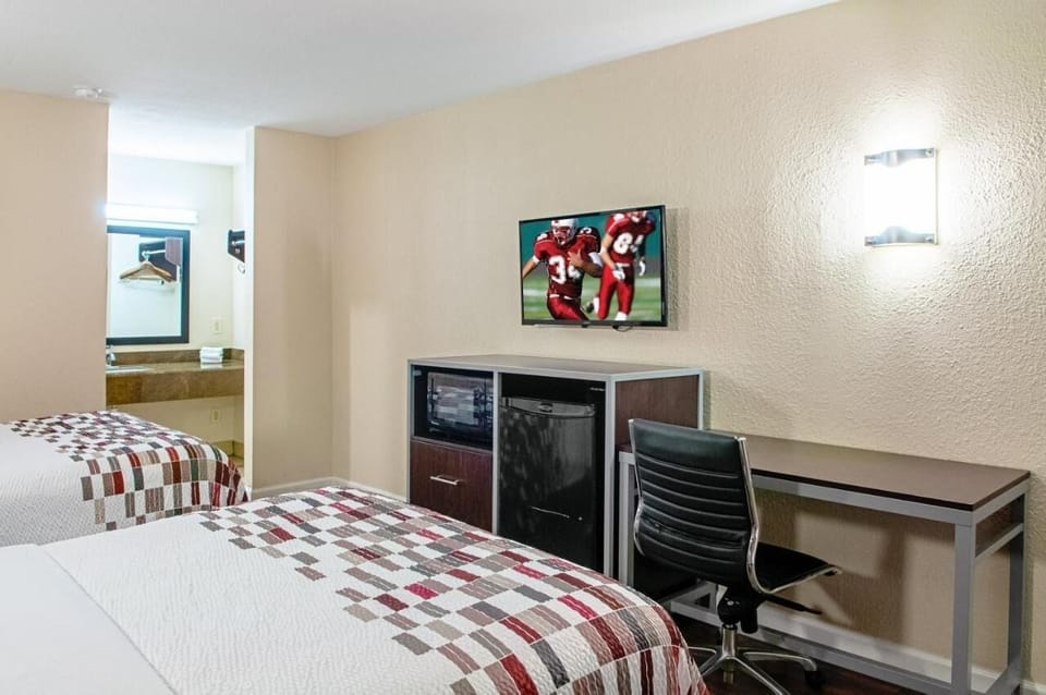 Catch up on work, then relax with TV and snacks.