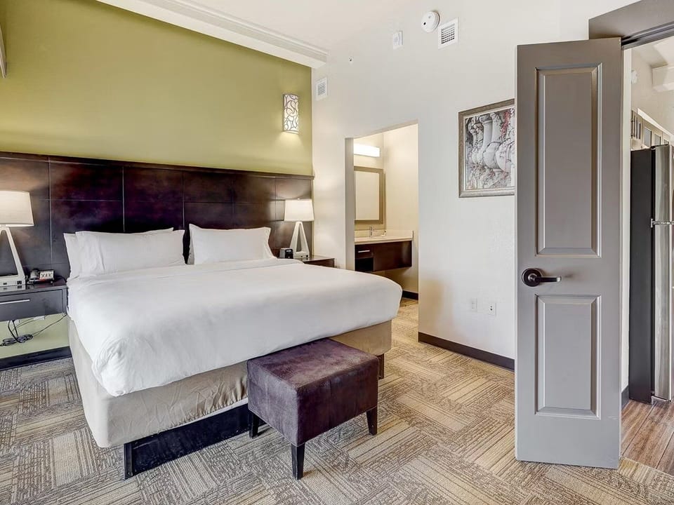 Sink into a king bed wrapped in crisp, hotel-white linens.