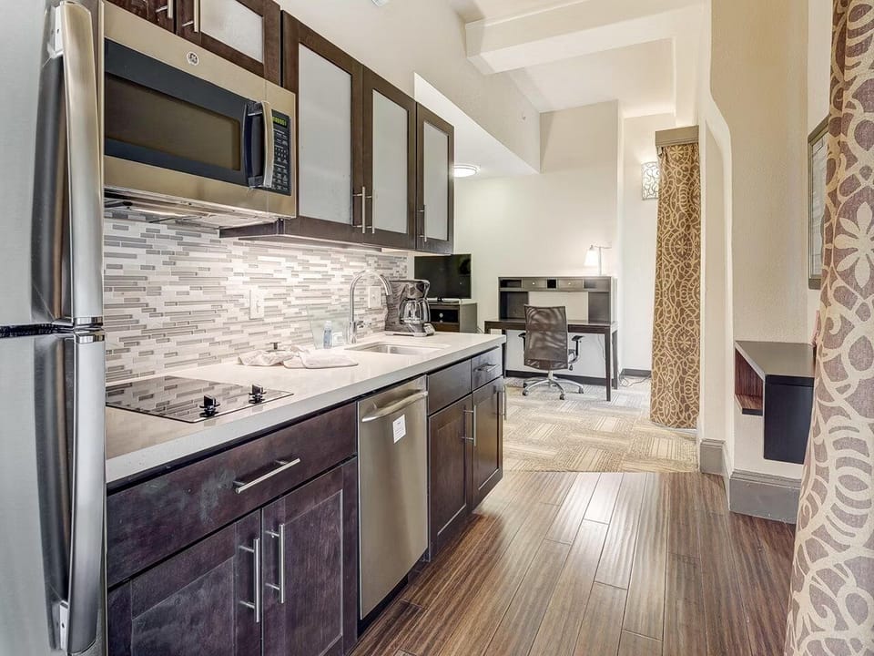 Prep quick meals on generous counters with full-size appliances.