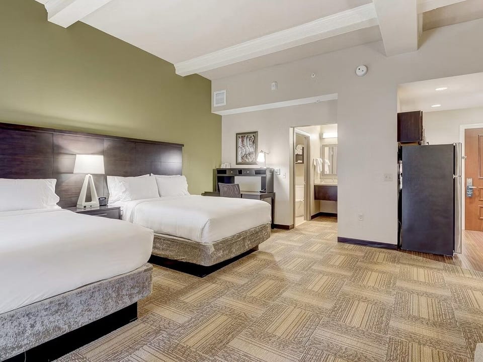 Settle into plush double beds for effortless, restful sleep.
