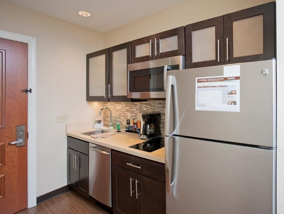 Start mornings easily with fridge, microwave, and coffee station.