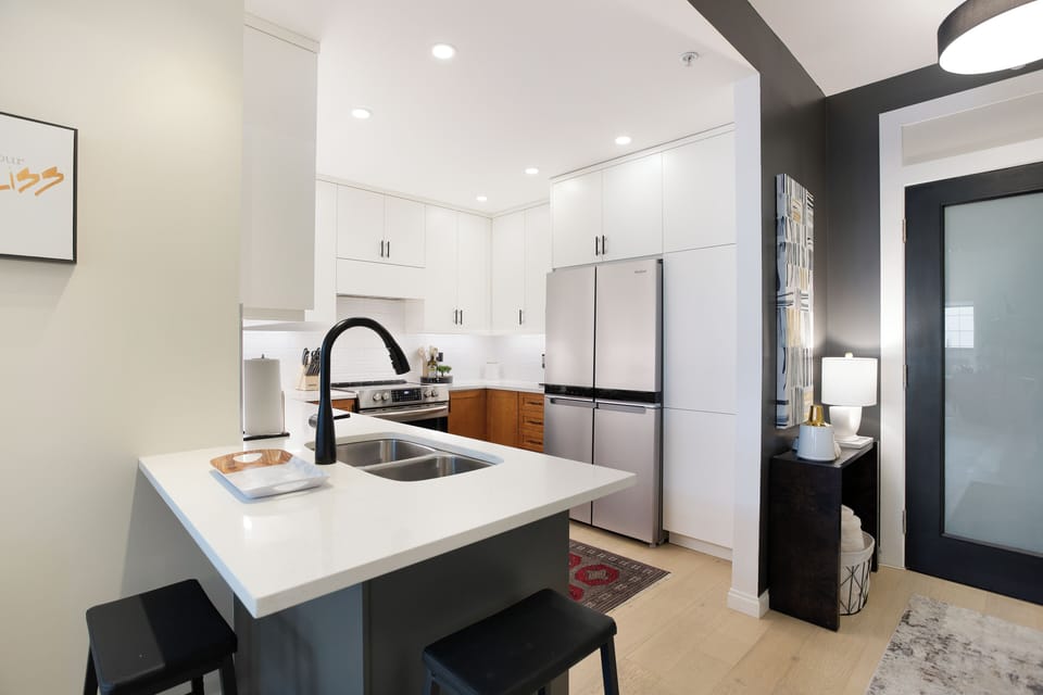 Views of the kitchen island and kitchen setup.