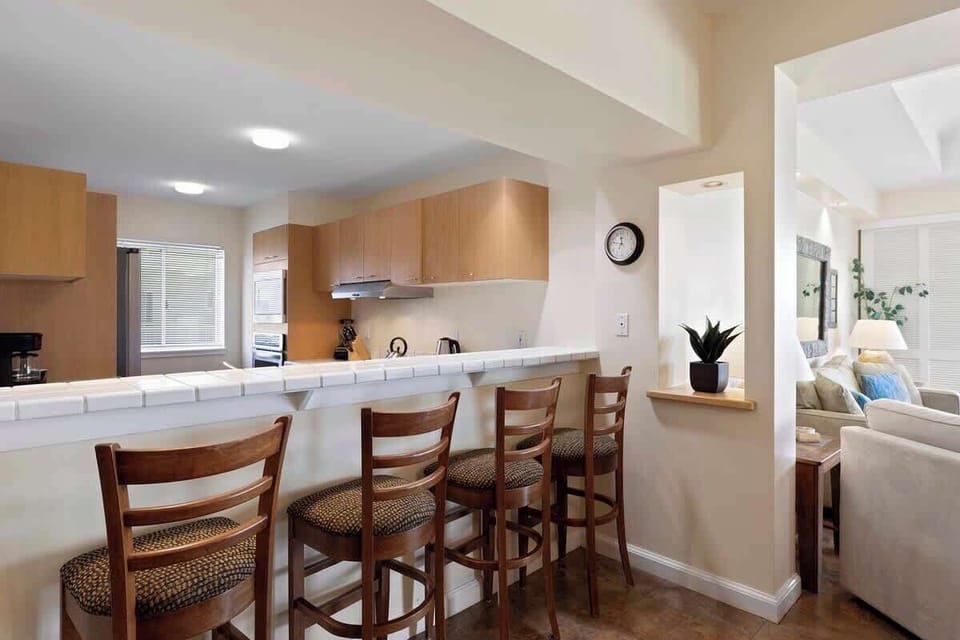 Start your day at the breakfast bar with Kona coffee and views of your tropical oasis.