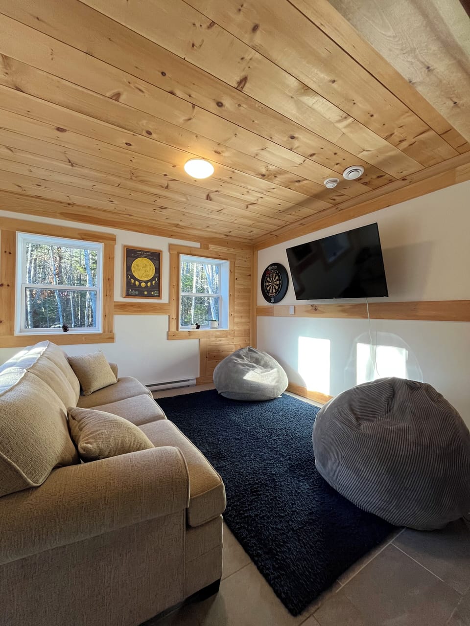 Living room with access into a private garden space.