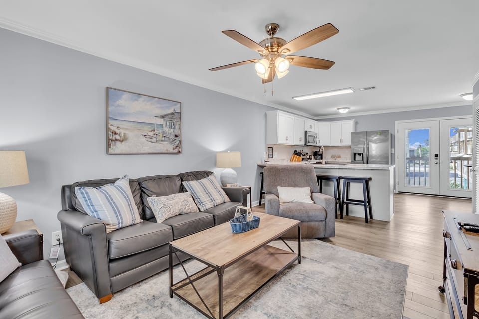 Living room. Sleeper sofa. Sleeps 2. Sand Dollar unit 5. 2 bedrooms. 1.5 bathrooms. Gulf Shores, AL 36542. Managed by Island Rentals.