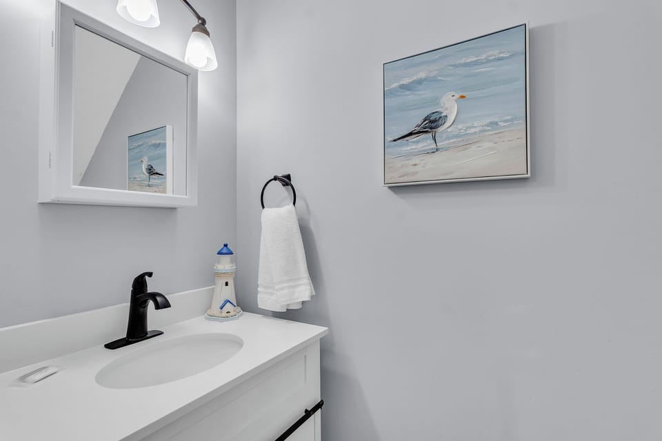 Half bath. Sand Dollar unit 5. 2 bedrooms. 1.5 bathrooms. Gulf Shores, AL 36542. Managed by Island Rentals.