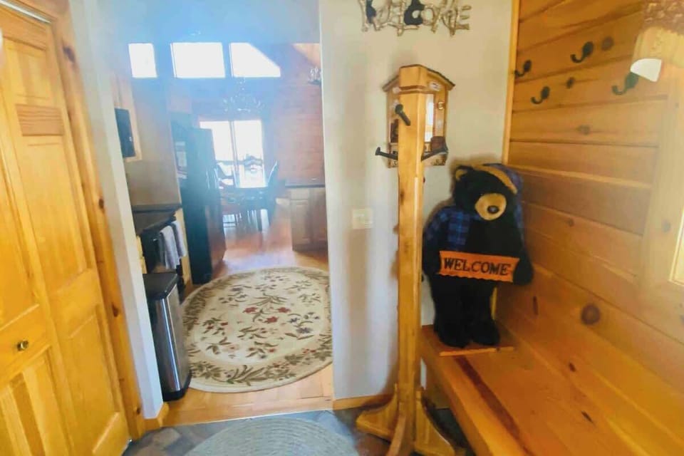Large mud room from entry into kitchen - large washer and dryer on the left (closet)