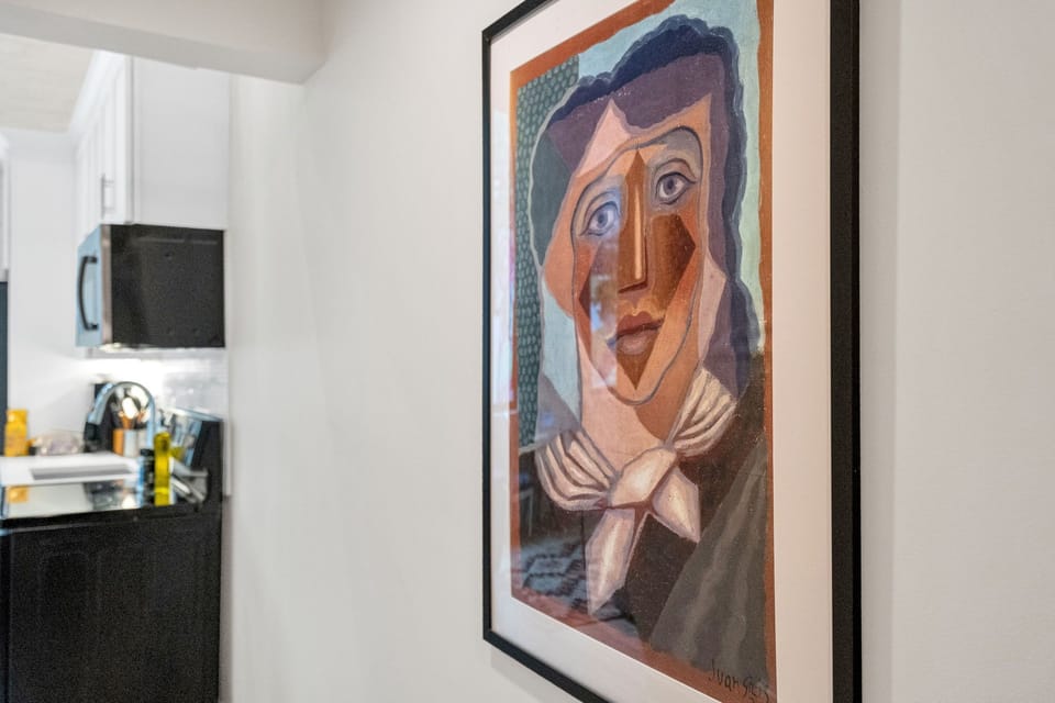 Eclectic local artwork adds a touch of personality and charm to your stylish stay.