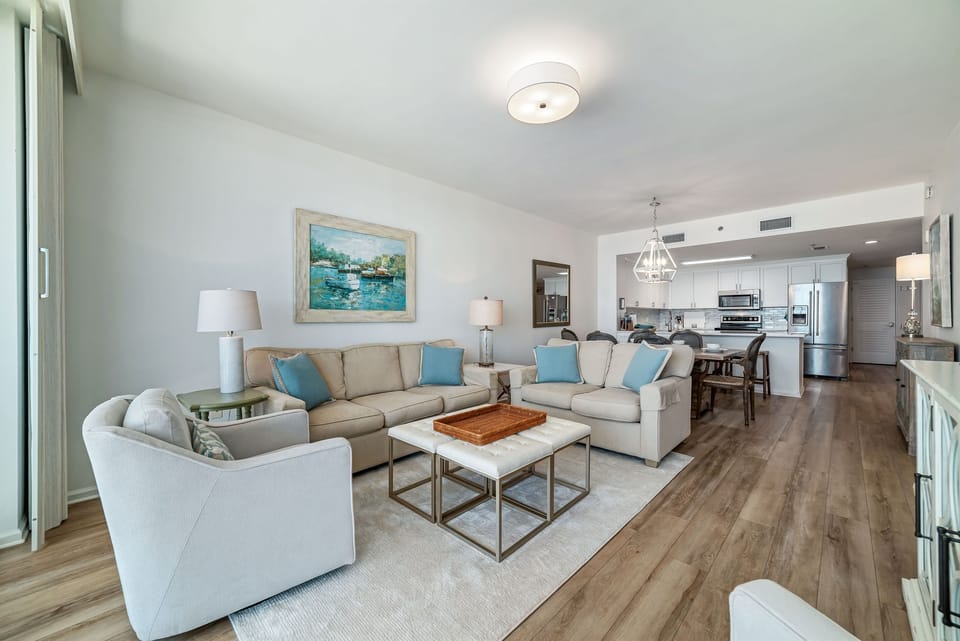 This thoughtfully designed living space maximizes natural light and integrates seamlessly with the surrounding environment. The open-concept layout and expansive windows create a bright and airy atmosphere.