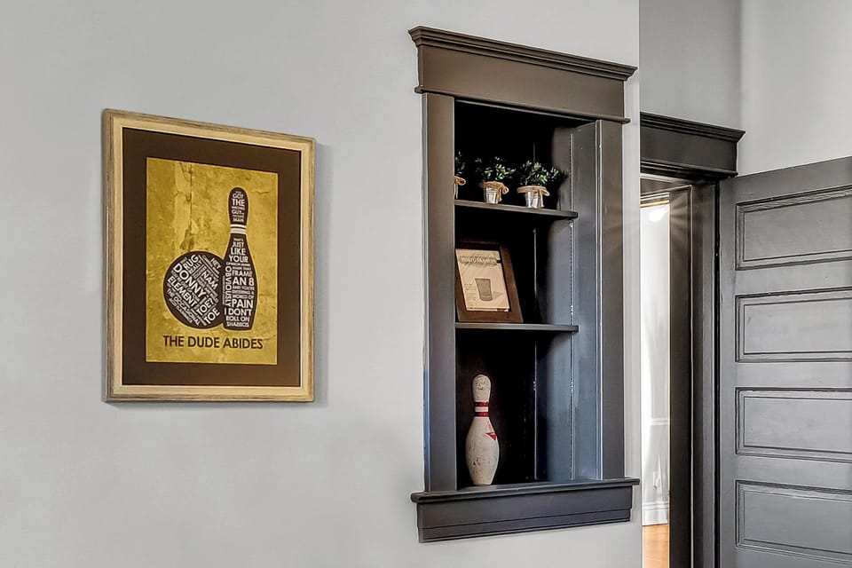 The Dude Abides!  Take a load off in our Big Lebowski White Russian Room.