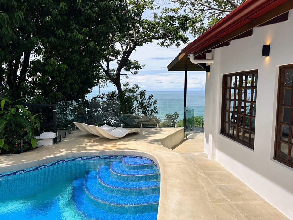 Take a dip in your private pool while enjoying the tropical setting