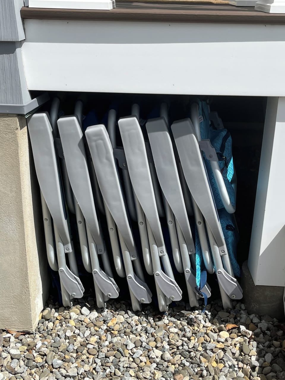 Beach chairs under the porch (8 in total); easy access yet kept clean and dry