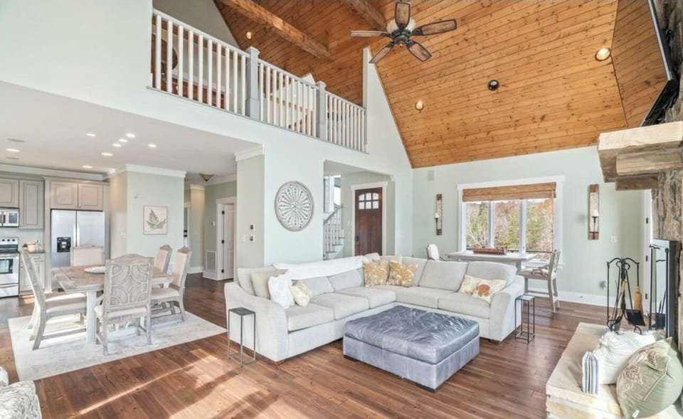 Comfy sectional in front of wood burning fireplace