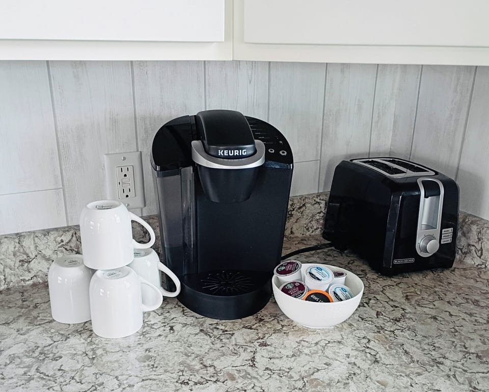 Keurig coffee pot and K cups plus a 12 cup coffee pot and grounds are provided