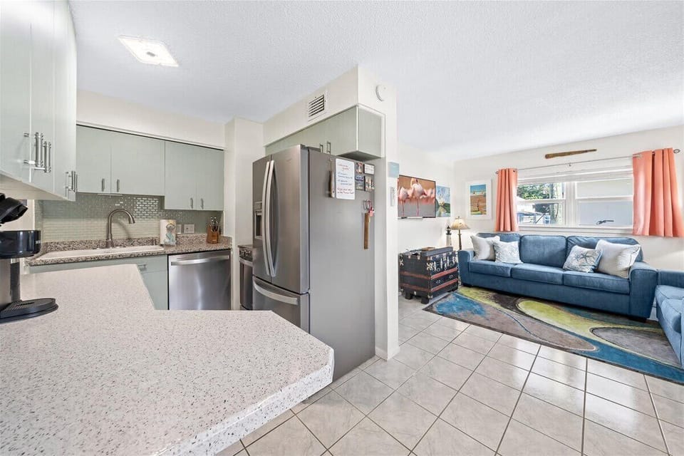 Open concept kitchen, eating area and living room