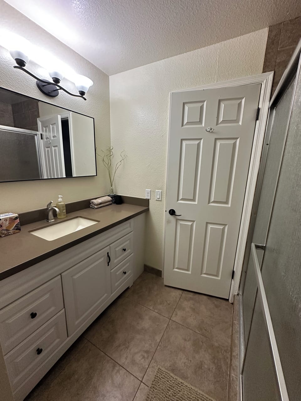 Master bathroom is surprisingly large with deep shower and extra counter space