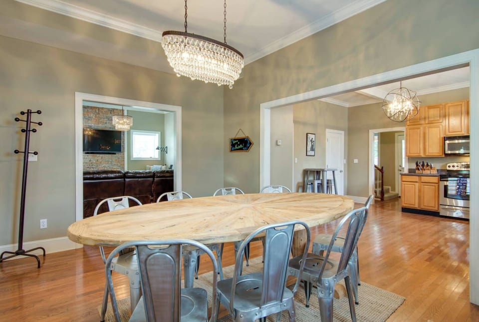 Gather ’round the HUGE dining table, plenty of room for all eight guests!