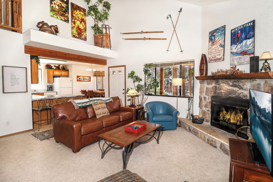 Living Area w/ Woodburning Fireplace