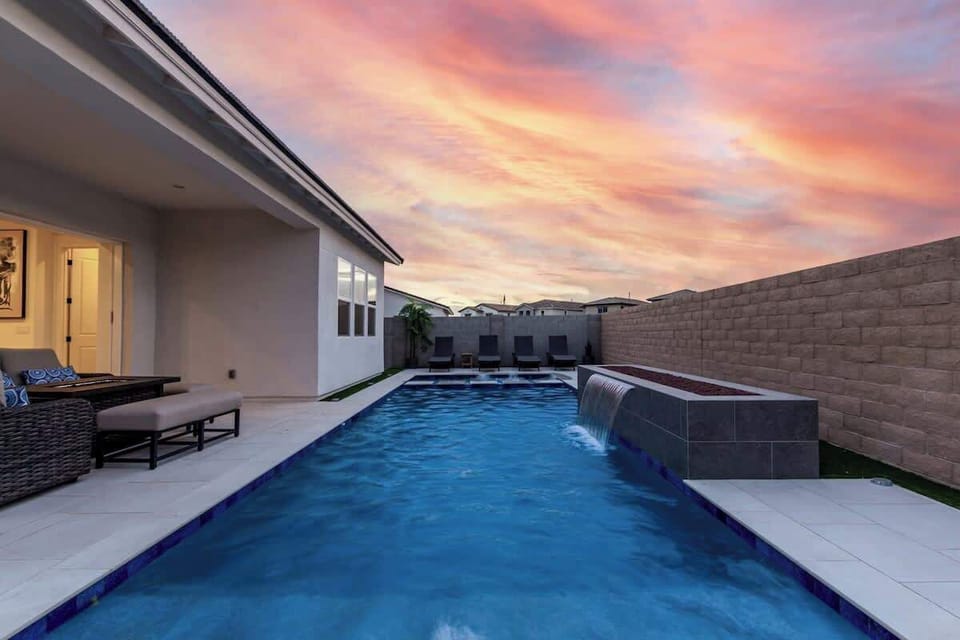 Unwind in the oversized hot tub, take a dip in the heated pool, or chill on the covered patio with a fire pit, BBQ, and epic sunset views—outdoor vibes at their best.