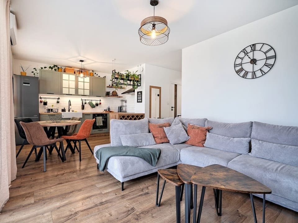 Living Room with Sofa Bed, Smart TV and Dining Table | Book Now with RENTUJEMY.COM