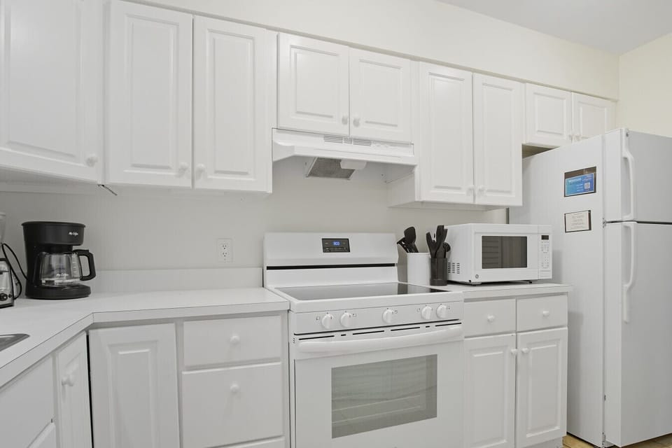 Full kitchen with access to laundry room