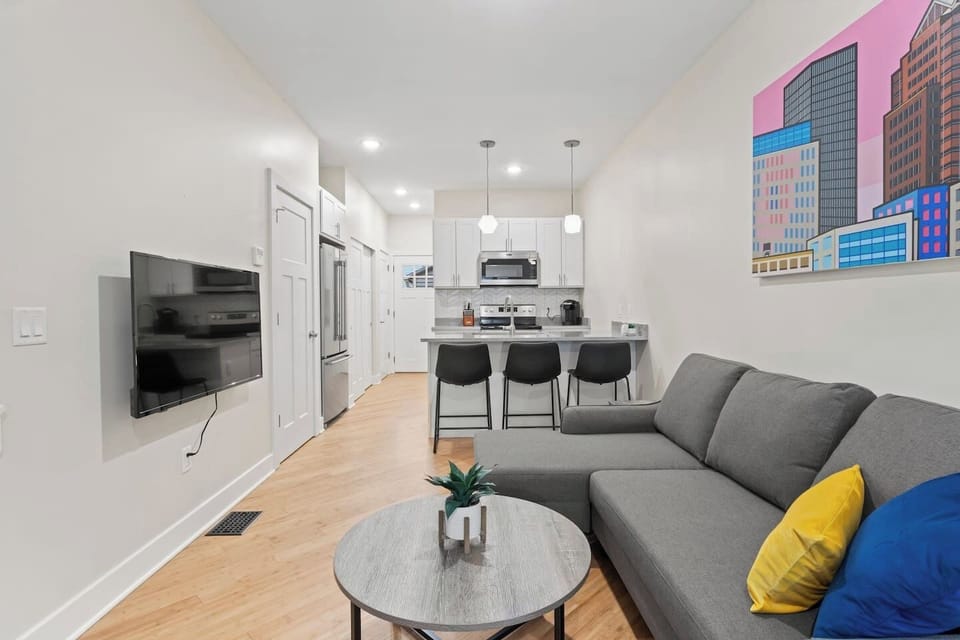Our open-concept kitchen and living room is the perfect space for creating unforgettable memories with family and friends, with ample room for socializing, cooking, and relaxing