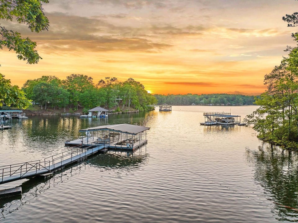 Lake house Sunsets are the best!  Enjoy yours from the Dock or the Deck!
