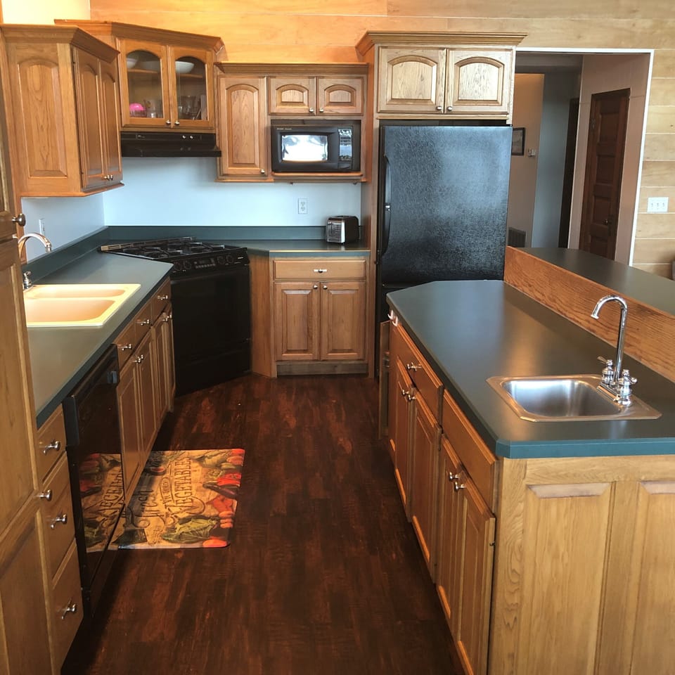 Kitchen in front portion of house