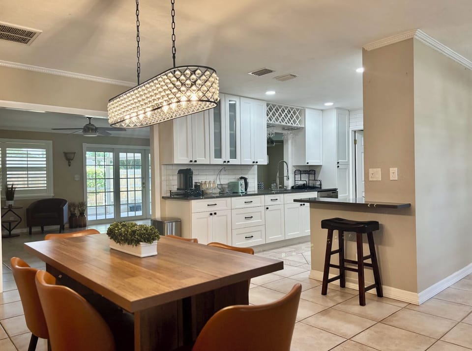 Gather around the table for family meals and games together.
