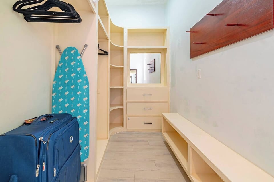 Spacious guest entry and storage designed for effortless island living