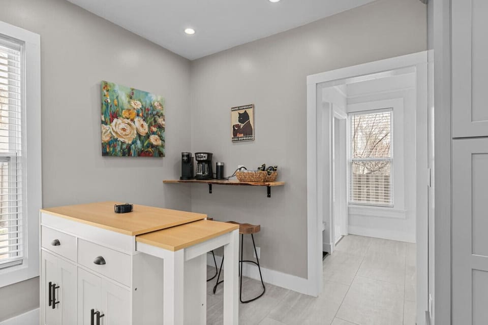 Sweet little coffee bar with Keurig and coffee maker.