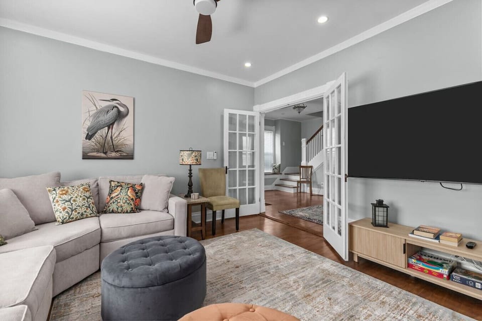 Relax in the living area with a Smart TV for streaming fun.