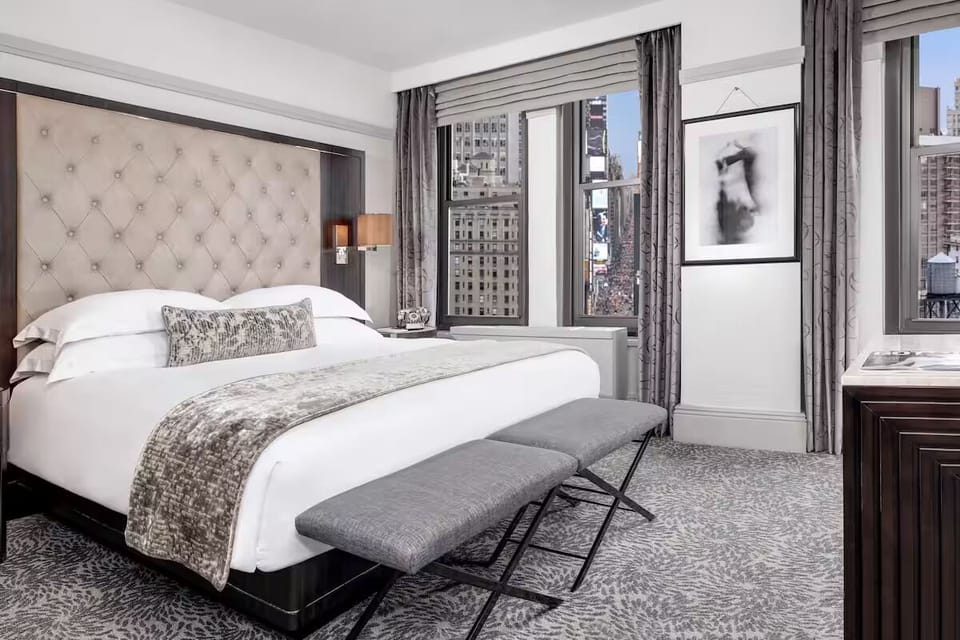 Soak up daylight and skyline views from your bed.