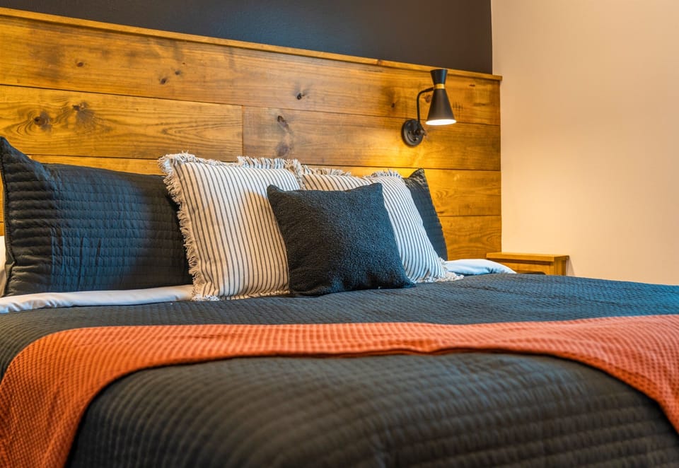 The second angle shows off the charming touches and layered textures that make this space feel warm and inviting.