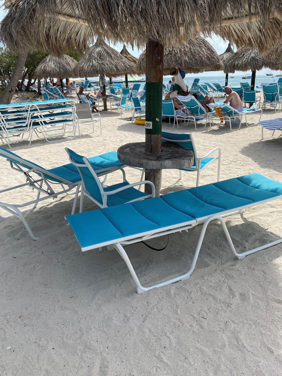 Ocean Club beach palapa, new chairs, and towels for all guests.