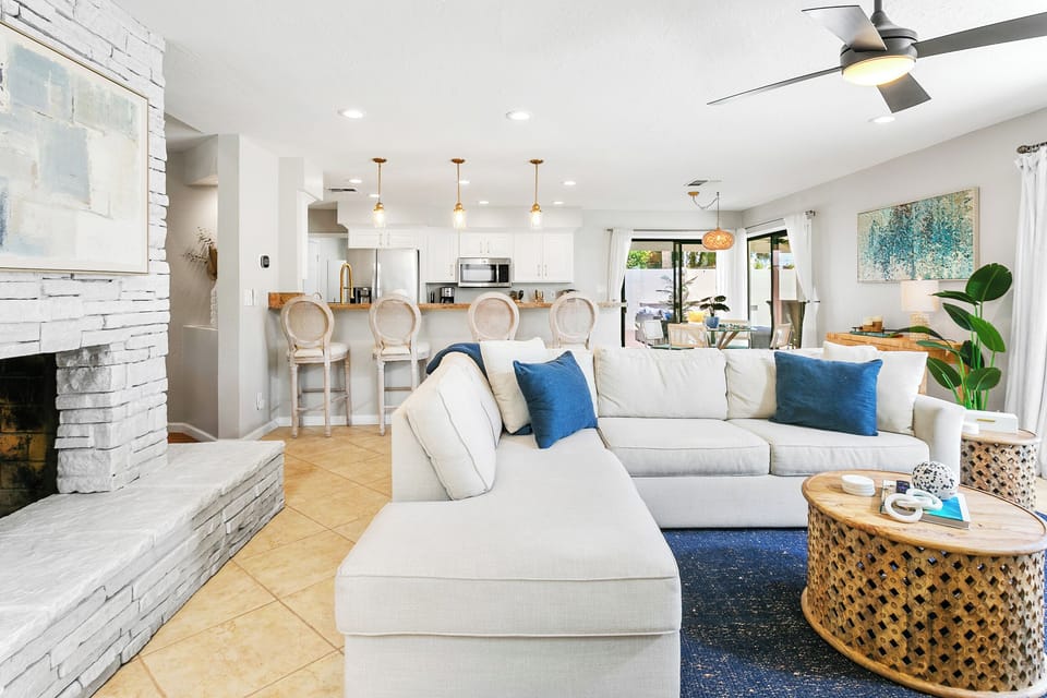 Family room space adjacent to kitchen and outdoor living