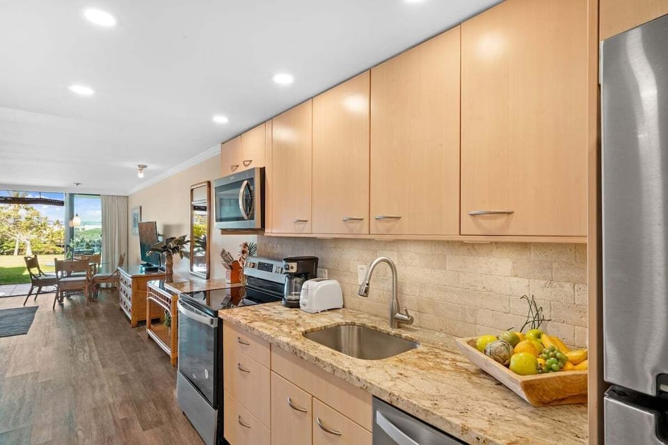 Functional kitchen with granite countertop