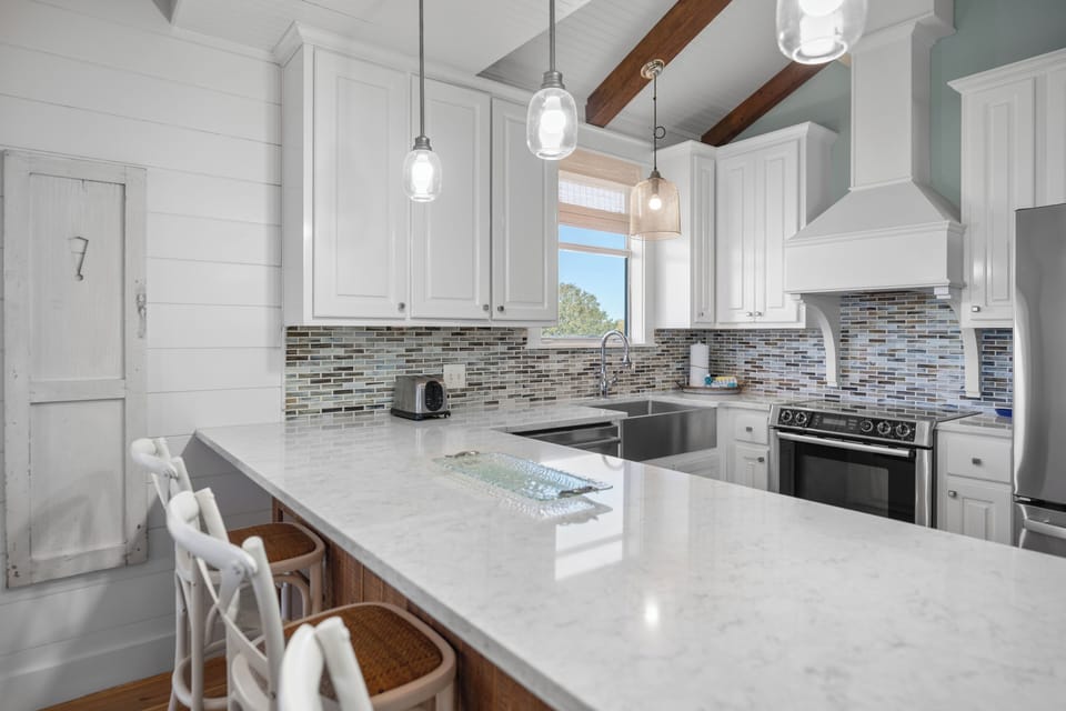 Stainless steel appliances and sleek counters—style meets function.

