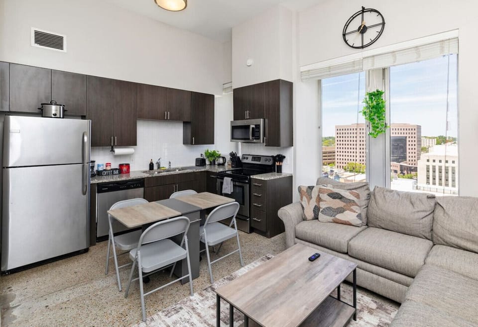 Kitchen and living area (shown here: portable foldable dining table)