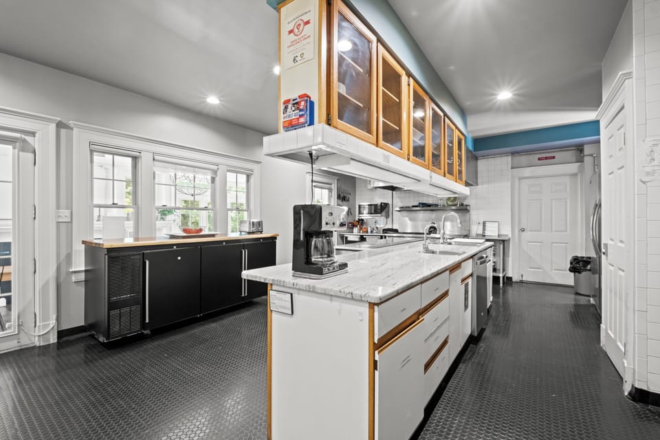 Spacious kitchen with large prep island and ample counter space.