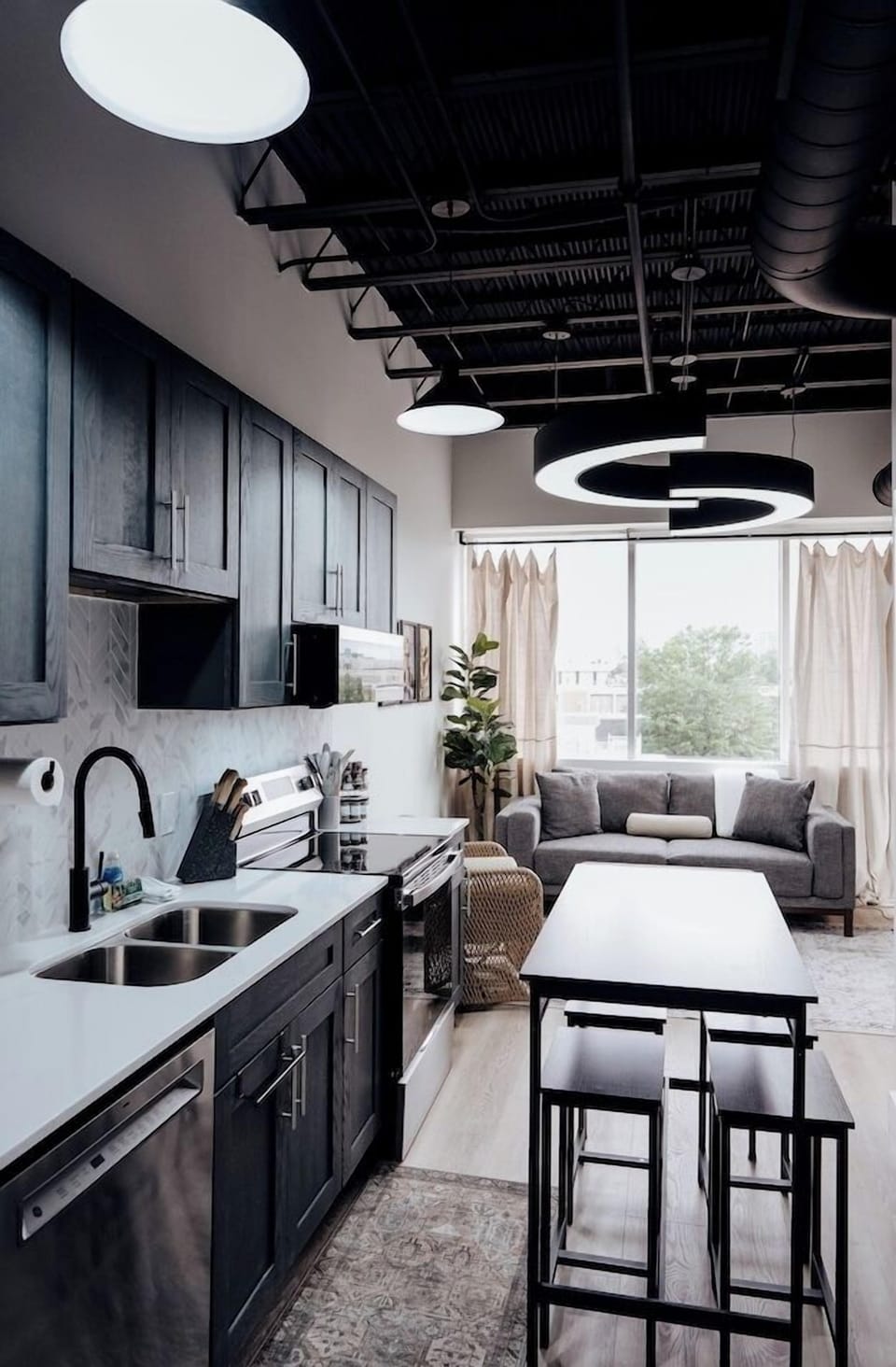 The kitchen is conveniently located right beside the living room