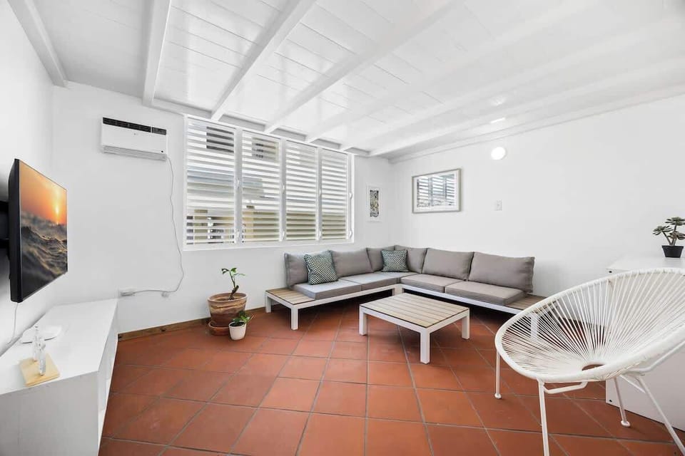 Cozy Living Room with Style. Enjoy the comfort of a sectional sofa and the charm of this inviting living space.