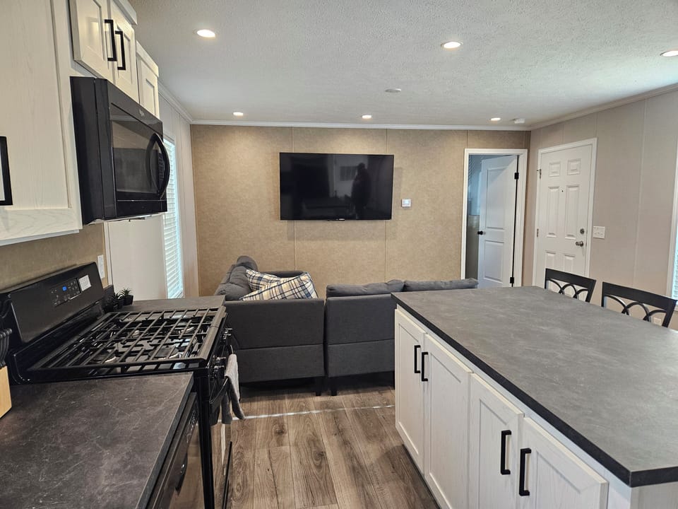 View from eat in kitchen to living room 