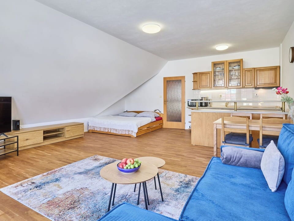 Furniture, Interior Design, Wood, Room, Floor, Flooring, Ceiling, Couch, Apartment, Wood Flooring