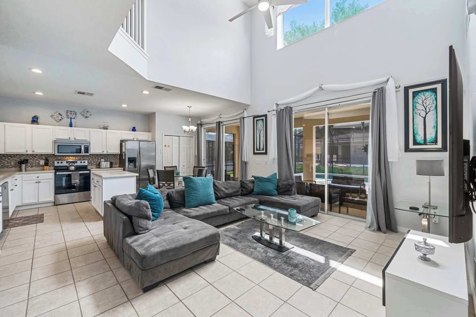 A bright, open space designed for comfort and connection — perfect for relaxing or watching movies together.