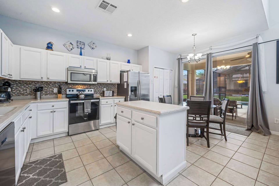 Cook with ease using stainless-steel appliances, spacious countertops, and all essentials for family meals