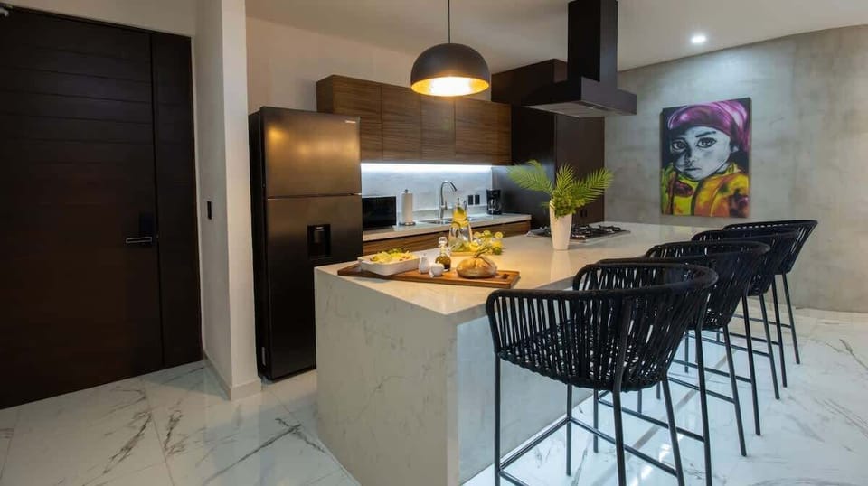 The breakfast bar can also serve as a laptop-friendly workspace if needed