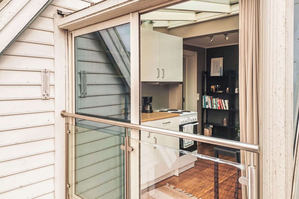Step into your dream kitchen where culinary creativity meets outdoor serenity. Imagine whipping up your favorite meals with a view that opens up to a beautiful balcony.